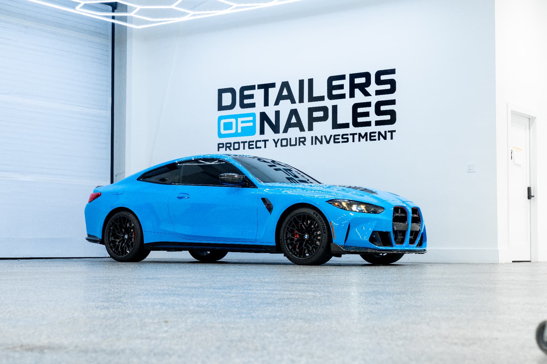 Vehicle protected with THE ESSENTIAL THREE PACKAGE inside the Detailers of Naples studio